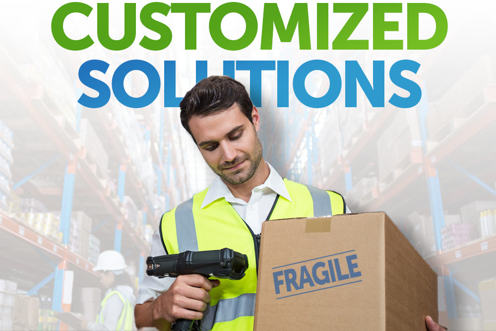 Man scanning boxes showing Customized logistic solutions